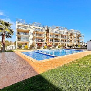key-ready apartment in the highly sought-after area of Villamartin. This almost-new 2-bedroom, 2-bathroom property